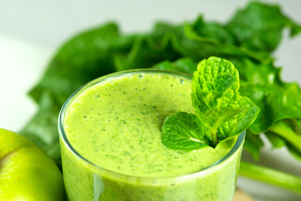 Healthy green vegetable smoothie with apples,spinach,cucumber,lime